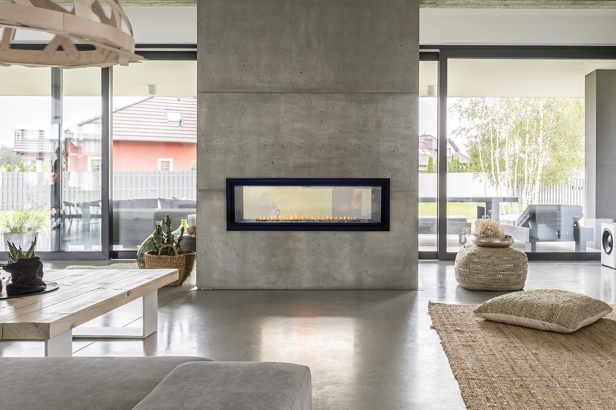 Empire Boulevard 48-inch see-through fireplace installed in a dividing wall
