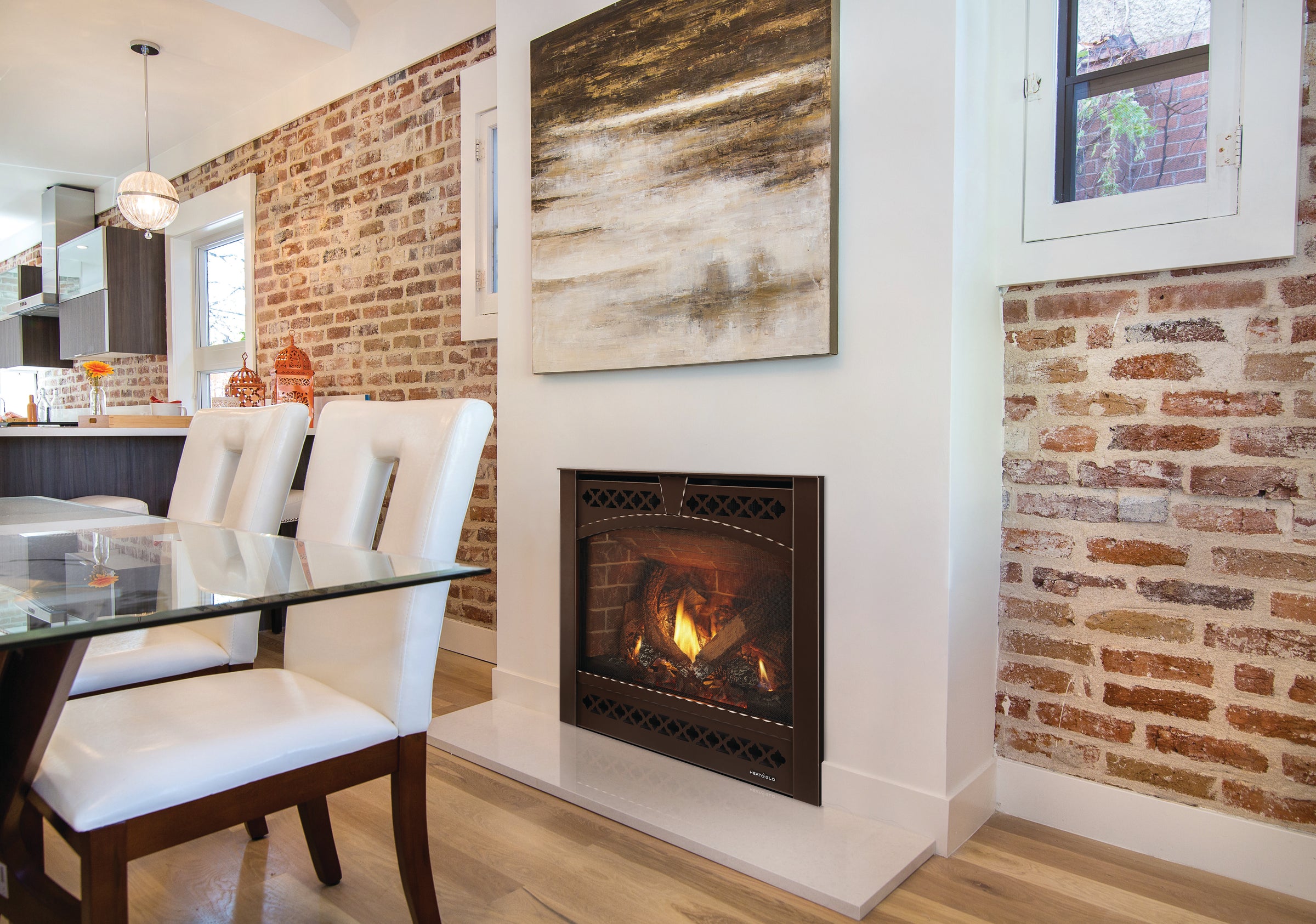 Heat & Glo SlimLine X 28 direct vent gas fireplace installed in a modern living room