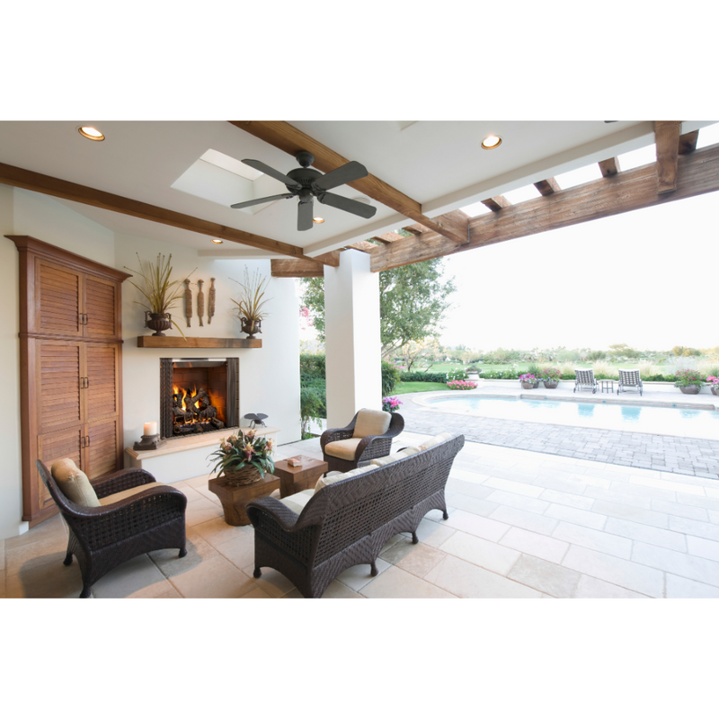 Majestic Castlewood built-in wood fireplace in a modern outdoor living area