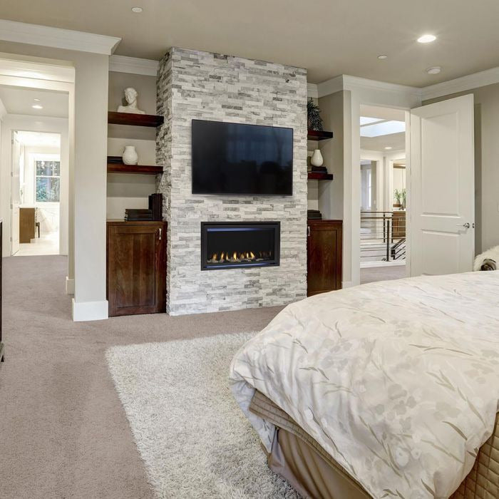 Majestic Jade direct vent gas fireplace installed in a bedroom