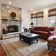 Majestic Ruby direct vent gas fireplace insert in a cozy traditional interior