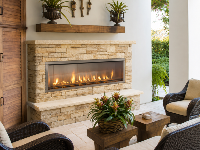 Superior VRE4600 linear gas fireplace in a contemporary outdoor seating area