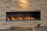 Superior VRE4600 vent-free gas fireplace installed in a stone wall
