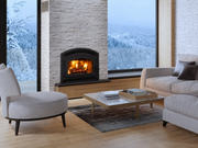 Superior WCT6920 wood-burning fireplace installed in a warm modern living space